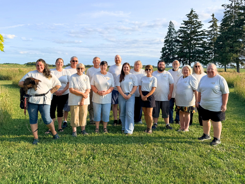 ADVOCAP board members standing outside in matching ADVOCAP tshirts.